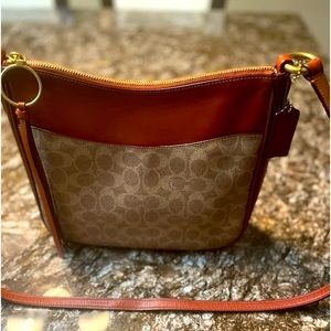 COACH CROSSBODY WITH ZIPPER CLOSURE AND FRONT POCKET AND BACK POCKET